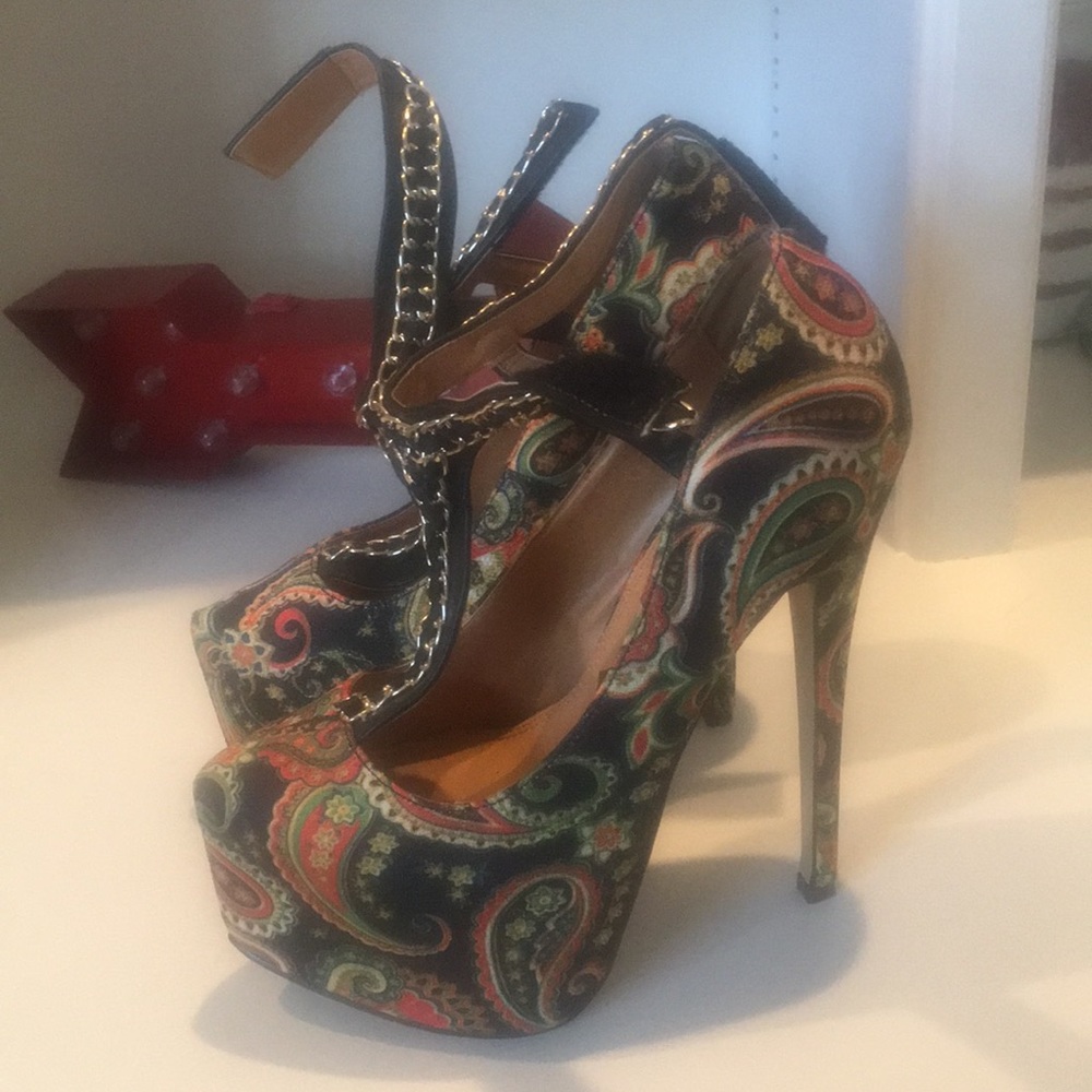 6 inches Multi colored heels, worn one time